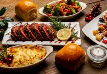 치팅 데이의 정석: 폭식이 아닌 보상으로, 다이어트 정체기를 뚫어주는 영리한 한 끼 bread on white ceramic plate beside sliced bread on table