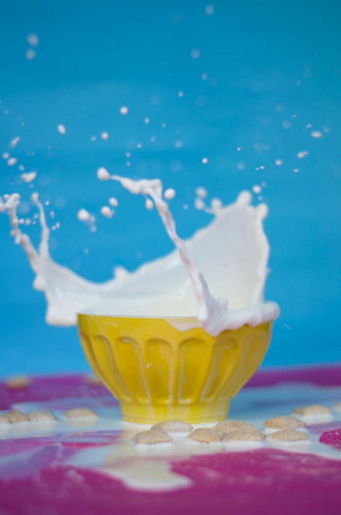 Photo by Daniela Díaz milk on yellow bowl