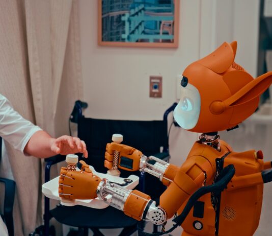 AI 시대, 건강 관리도 똑똑하게…일상에서 실천하는 ‘스마트 건강 루틴’ Man gives robot bottles on a tray